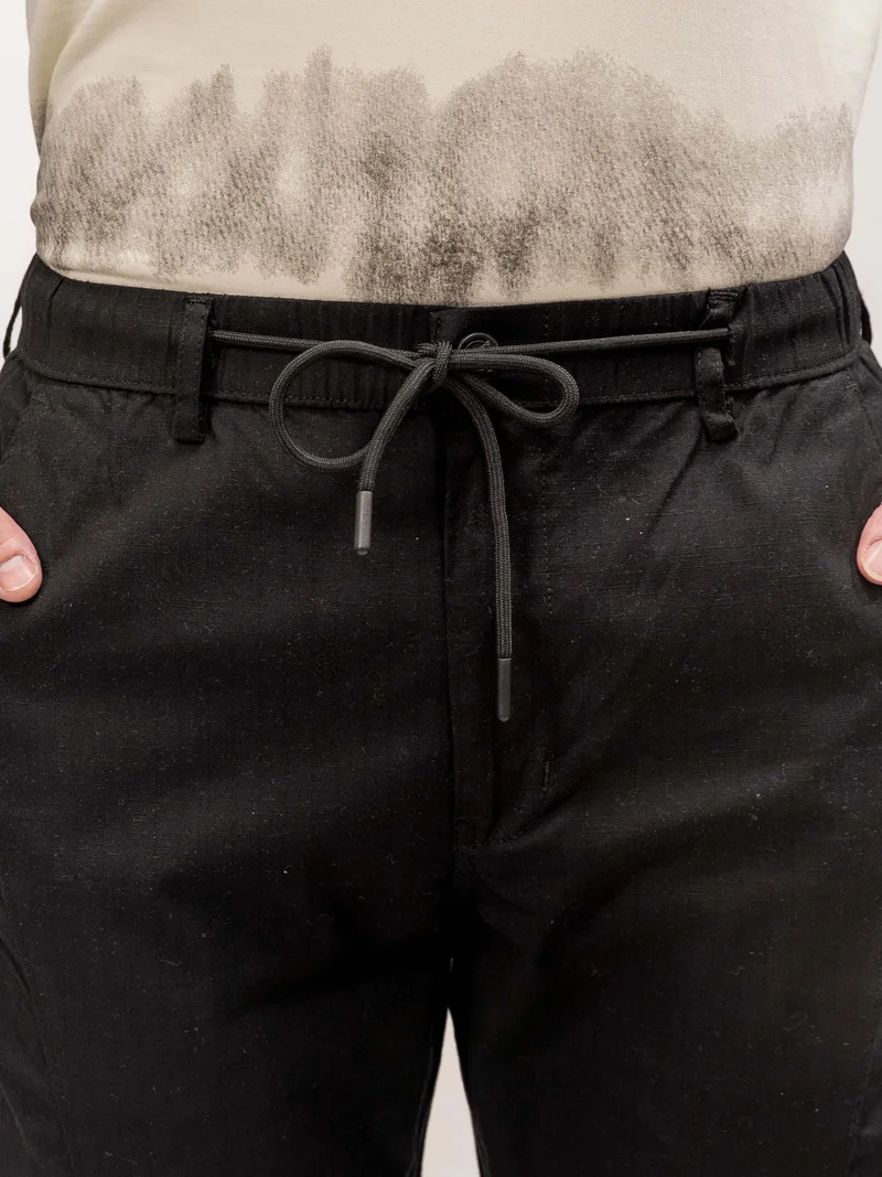 Maniac  Maniac Mens Cut and Sew Solid Black Cotton Trackpant for Men | Best Price UAE